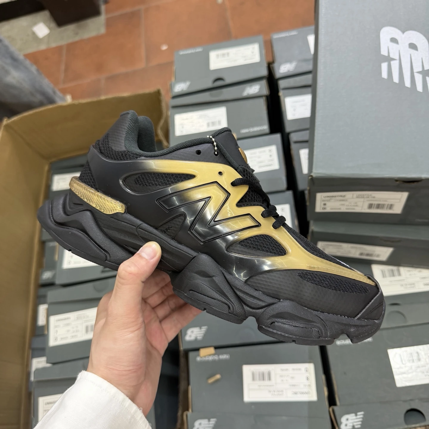 New Balance Black Gold Futuristic Chunky Sneakers