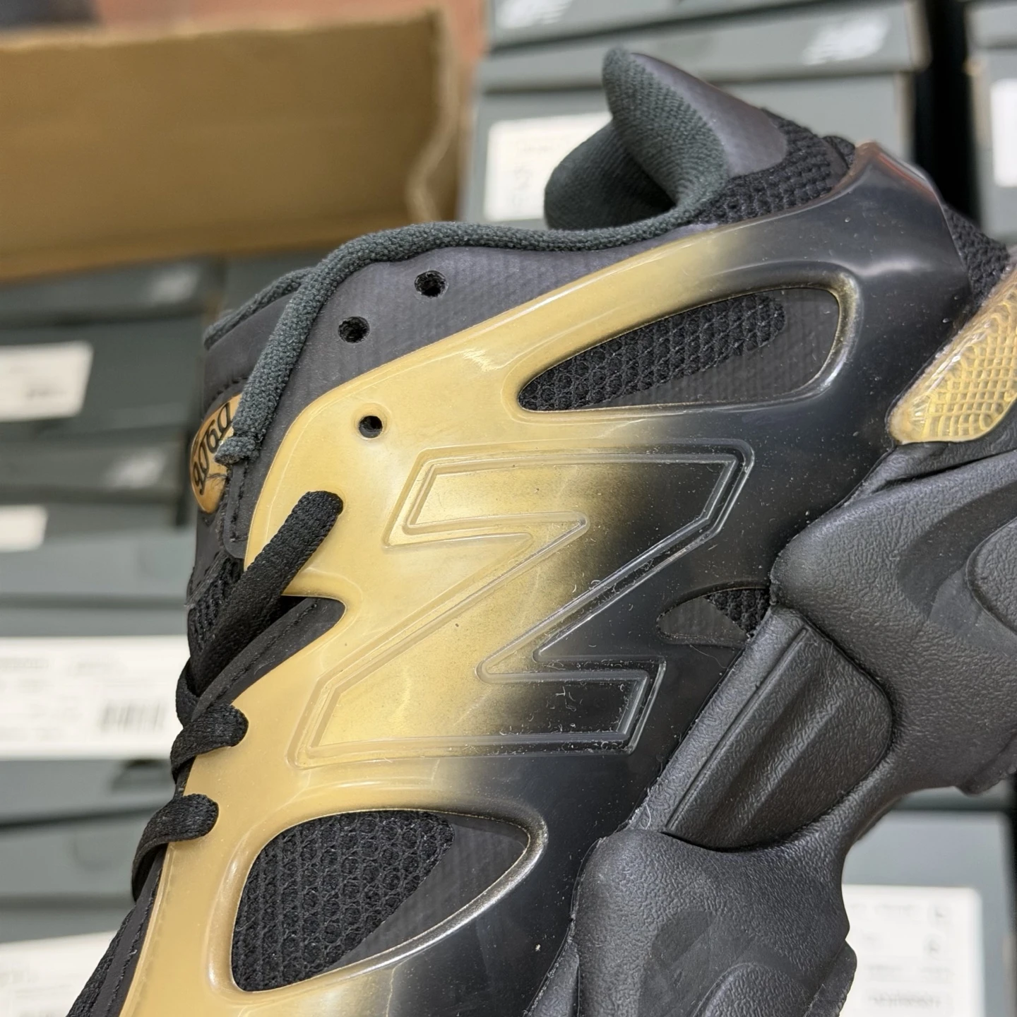 New Balance Black Gold Futuristic Chunky Sneakers