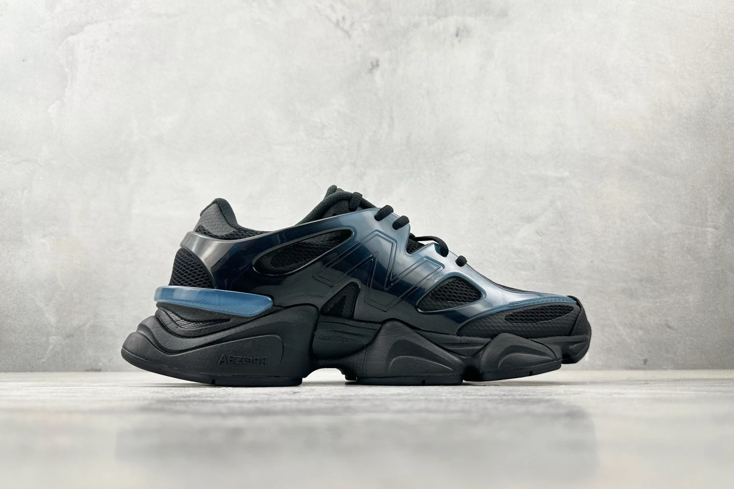 New Balance 9060 Phantom Black Futuristic Sneakers – Premium Gloss Black Chunky Streetwear Running Shoes With ABZORB Cushioning For Men & Women