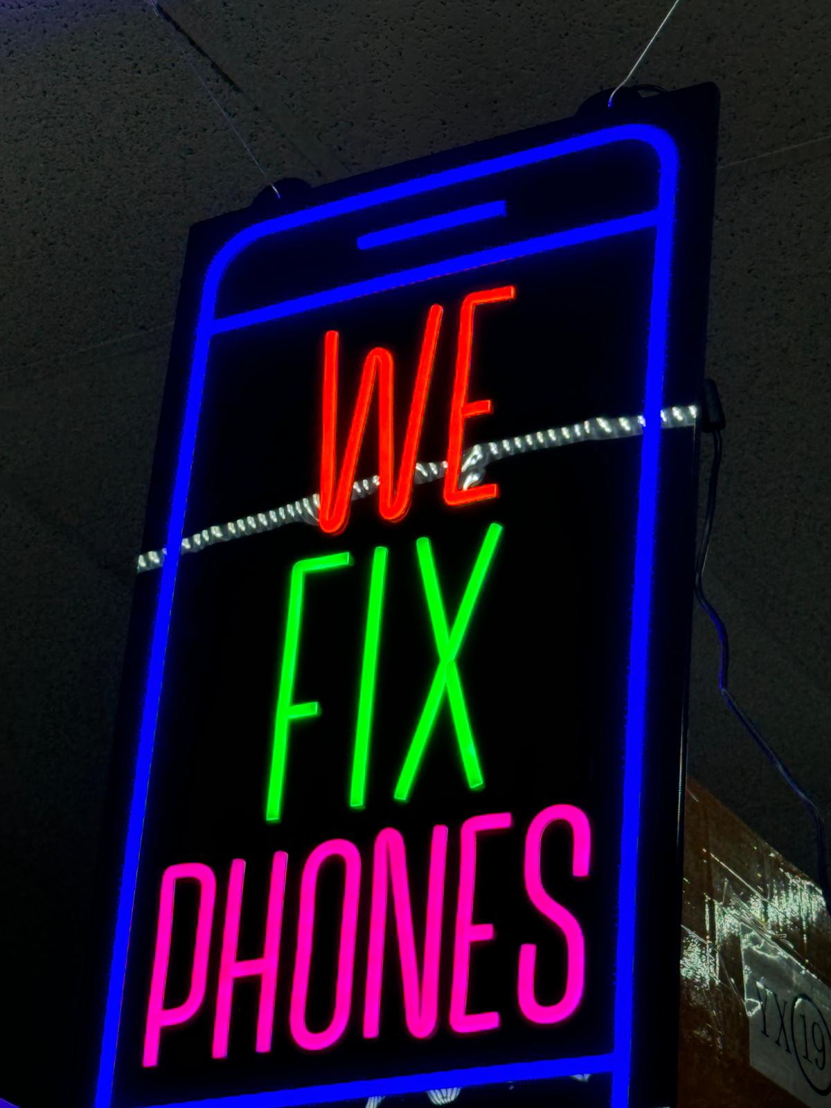 WE FIX PHONE NEON LED SIGN 18" x 36" - (Ground Shipping Only)