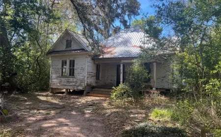 $159,000 Sweeny, TX: 7.5 Wooded Acres with Existing Structure & Utilities