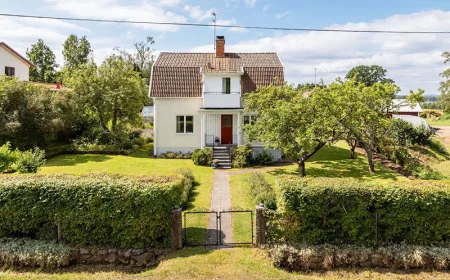 $192,733 Vimmerby Home for Sale: Cozy Retreat with Greenhouse & Charm