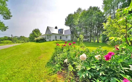 $175,000 Historic Orient, ME Farmhouse: 26 Acres & East Grand Lake Frontage