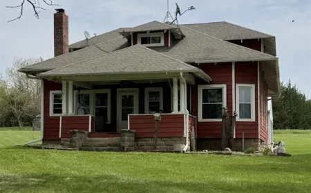 $175,000 Corning, IA Farmhouse: 5-Acre Homestead with Well & Outbuildings