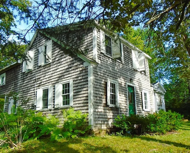 $175,000 Historic Pembroke Summer Home: 1847 Charm Meets Modern Upgrades