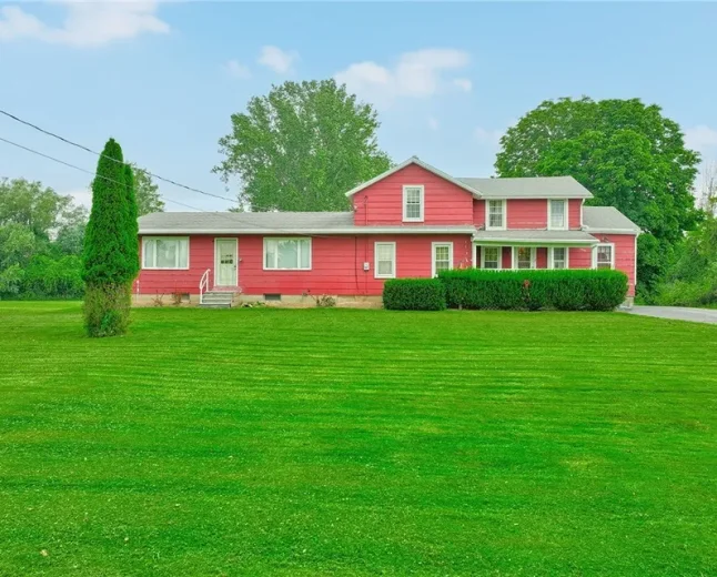 $150,000 Versatile 10-Acre Hamlin Farmhouse: Opportunity Near Lake Ontario