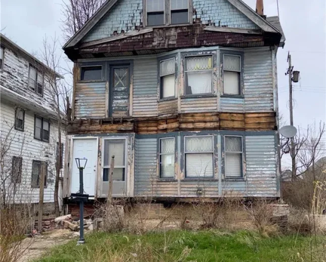 $19,900 East Cleveland Triplex: Investment Opportunity at 1749 Rosedale Avenue