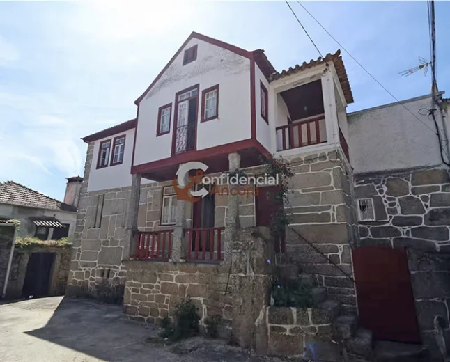 $131,255 Figueiró da Granja Stone House: Authentic Charm & Investment Potential