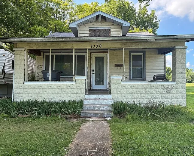 $25,000 Evansville Investment Opportunity: 2-Bed Home on Large Lot