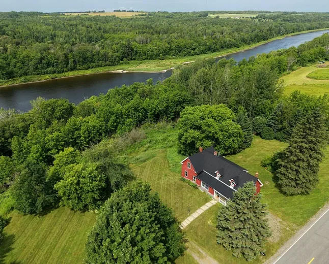 $154,900. Presque Isle Farmhouse: Riverfront Acreage, Trails & Potential