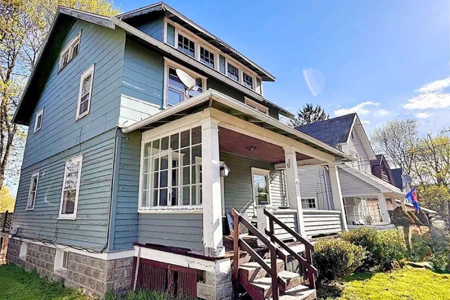 $24,000 Historic Jamestown Home: 3 Beds, Walk-Out Basement, 1910 Charm