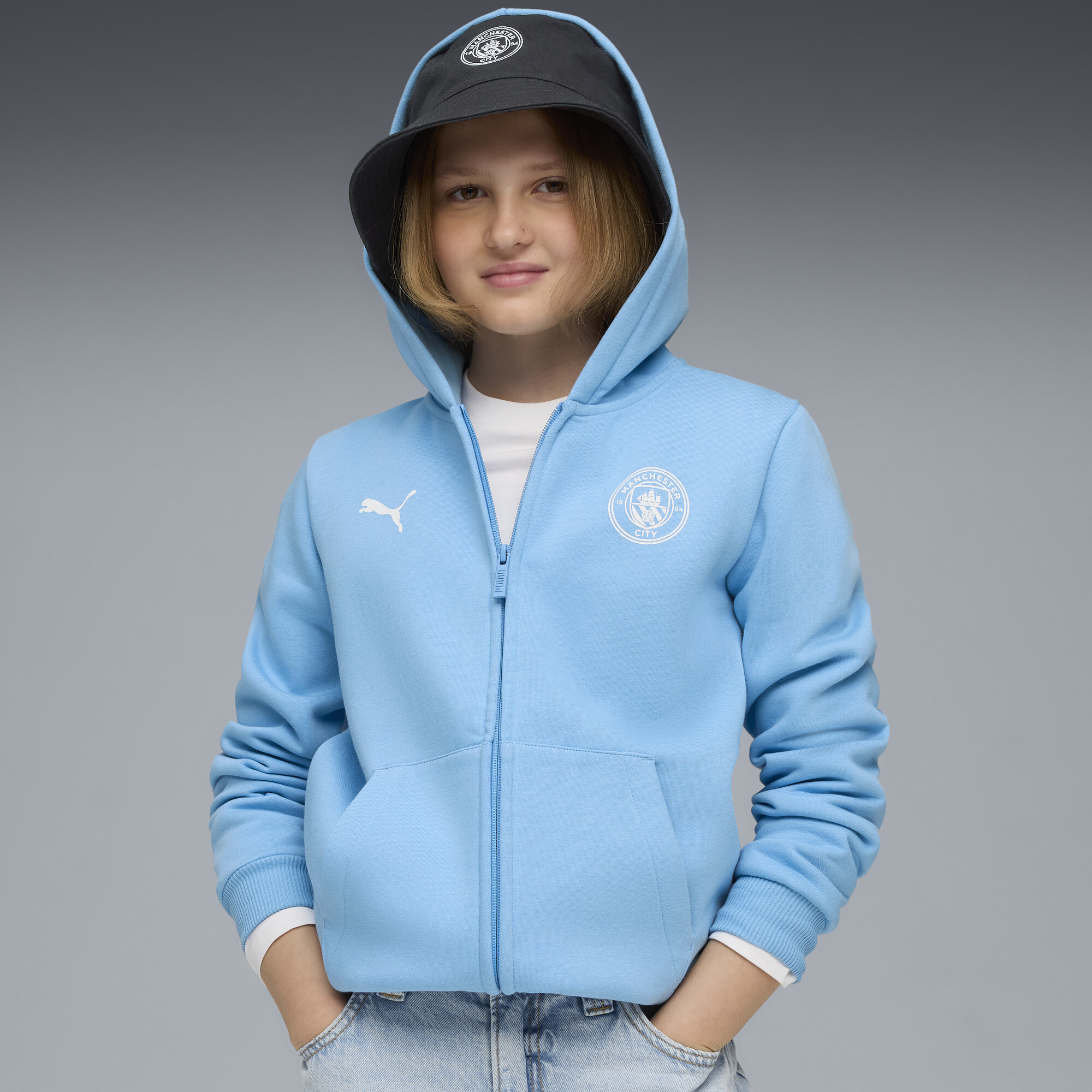 PUMA Manchester City FtblEssentials Kapuzenjacke Teenager, Kleidung, Blau, 15-16Y