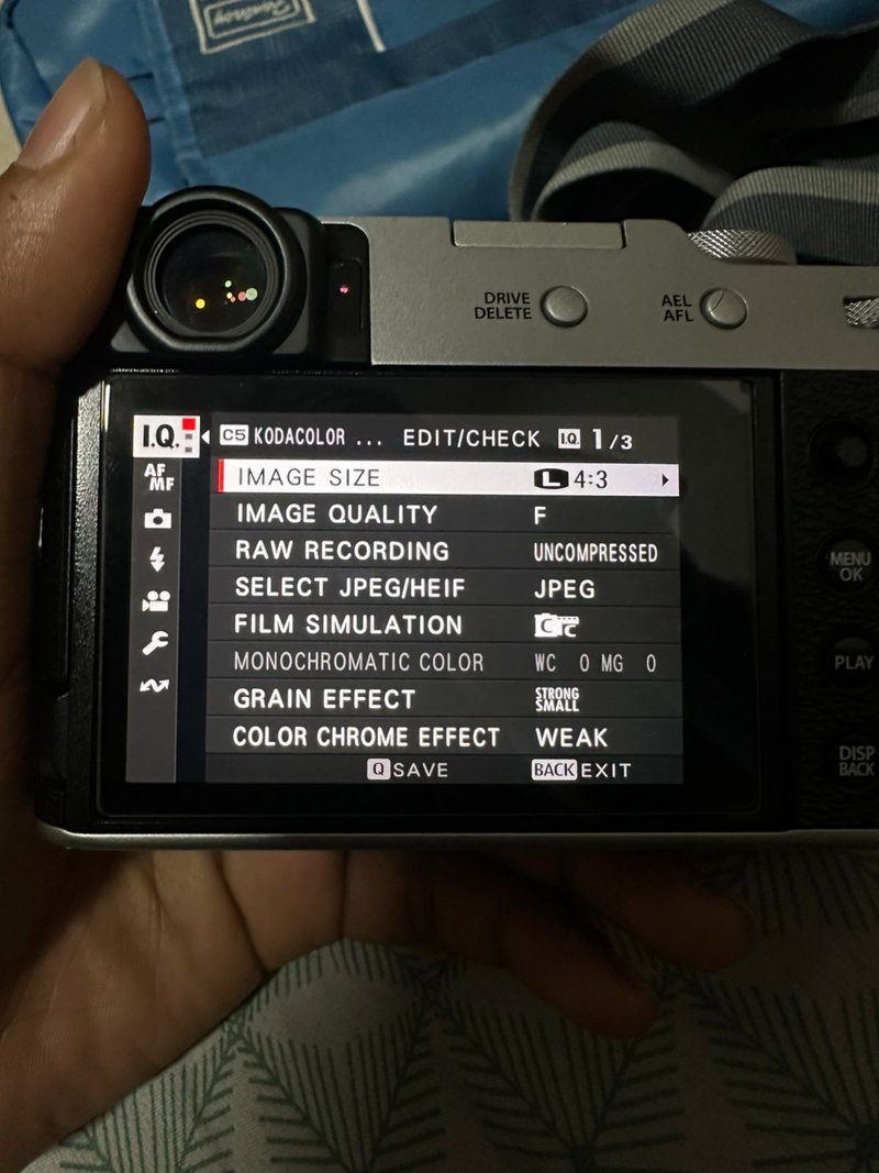 Close-up of a camera's settings display showing various options and adjustments.