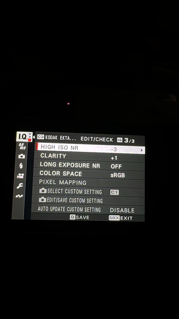 Camera settings display showing various options like clarity, high ISO NR, and color space.