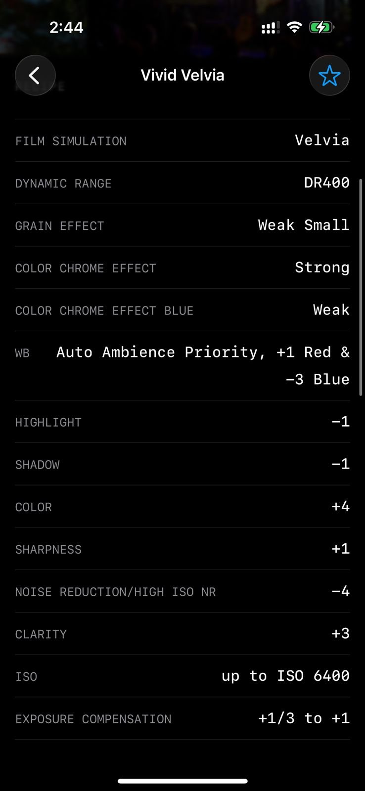 Settings for a Fujifilm film simulation recipe titled 'Vivid Velvia' displayed on a smartphone screen.