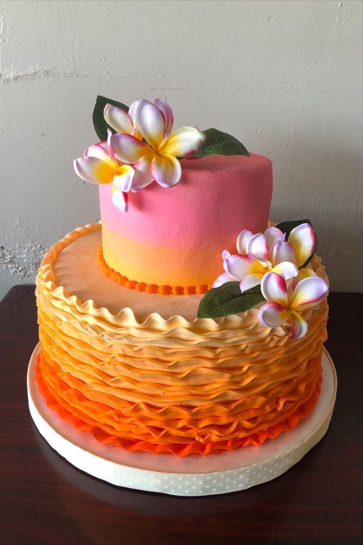 Pink-to-Orange Ombré Cake with Plumeria Flowers visual reference