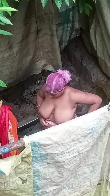Aunt from the village taking a bath