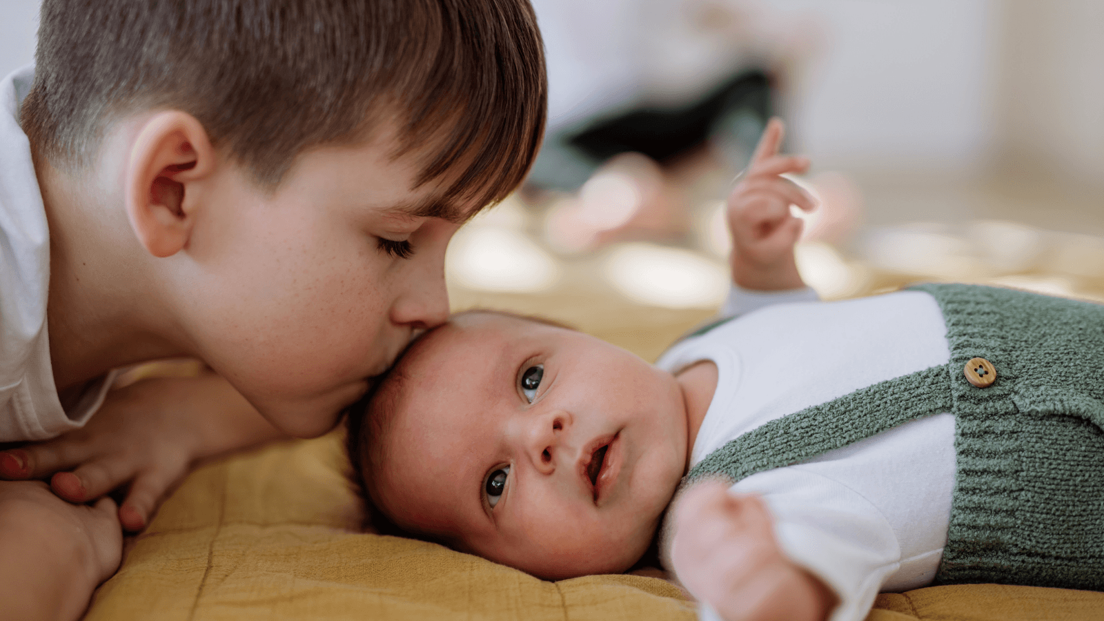 Big brother with a baby brother.
