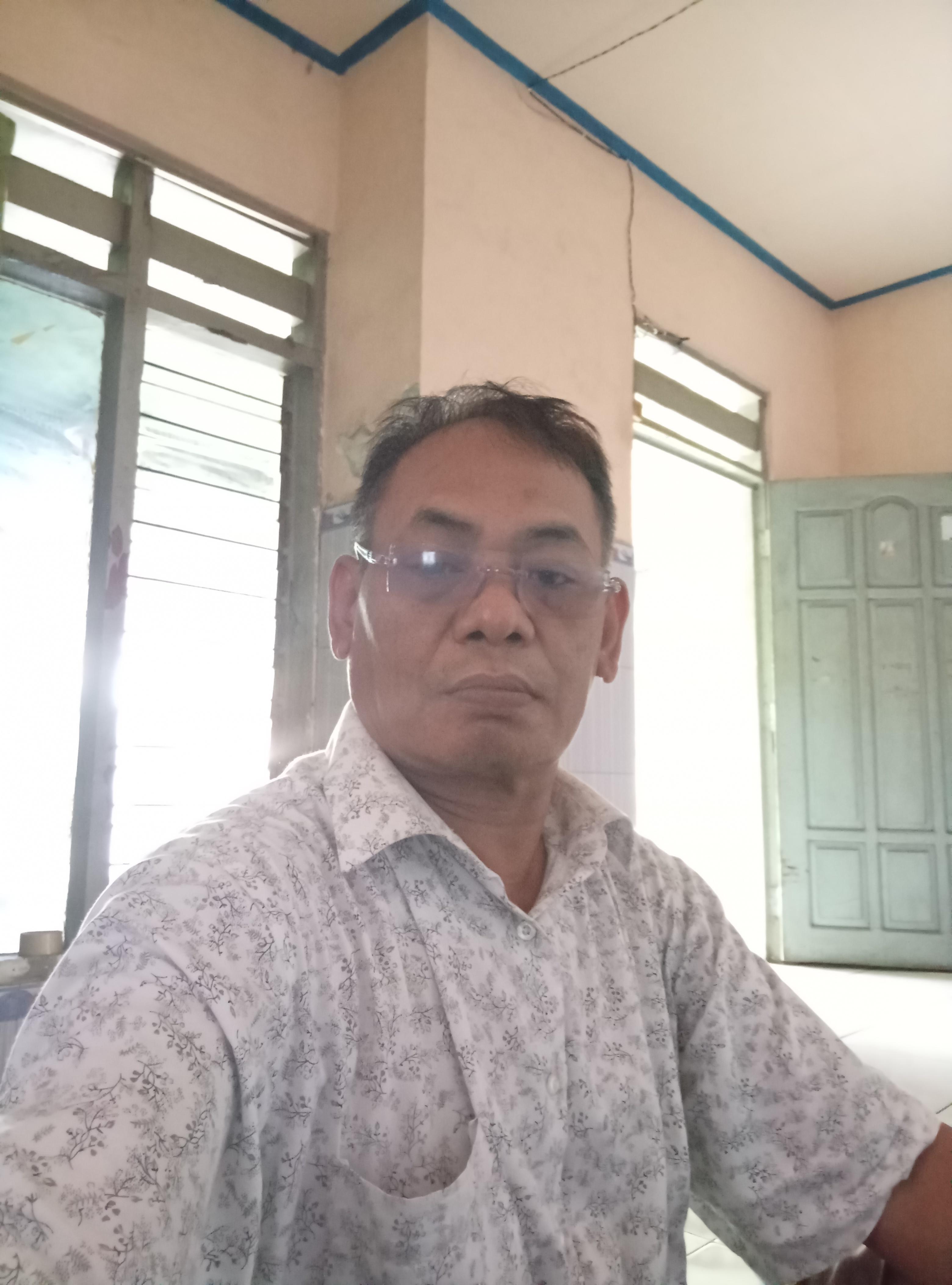 Tri  Budiono
