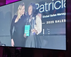 Photo 2 - Patricia Okyere collecting her award.