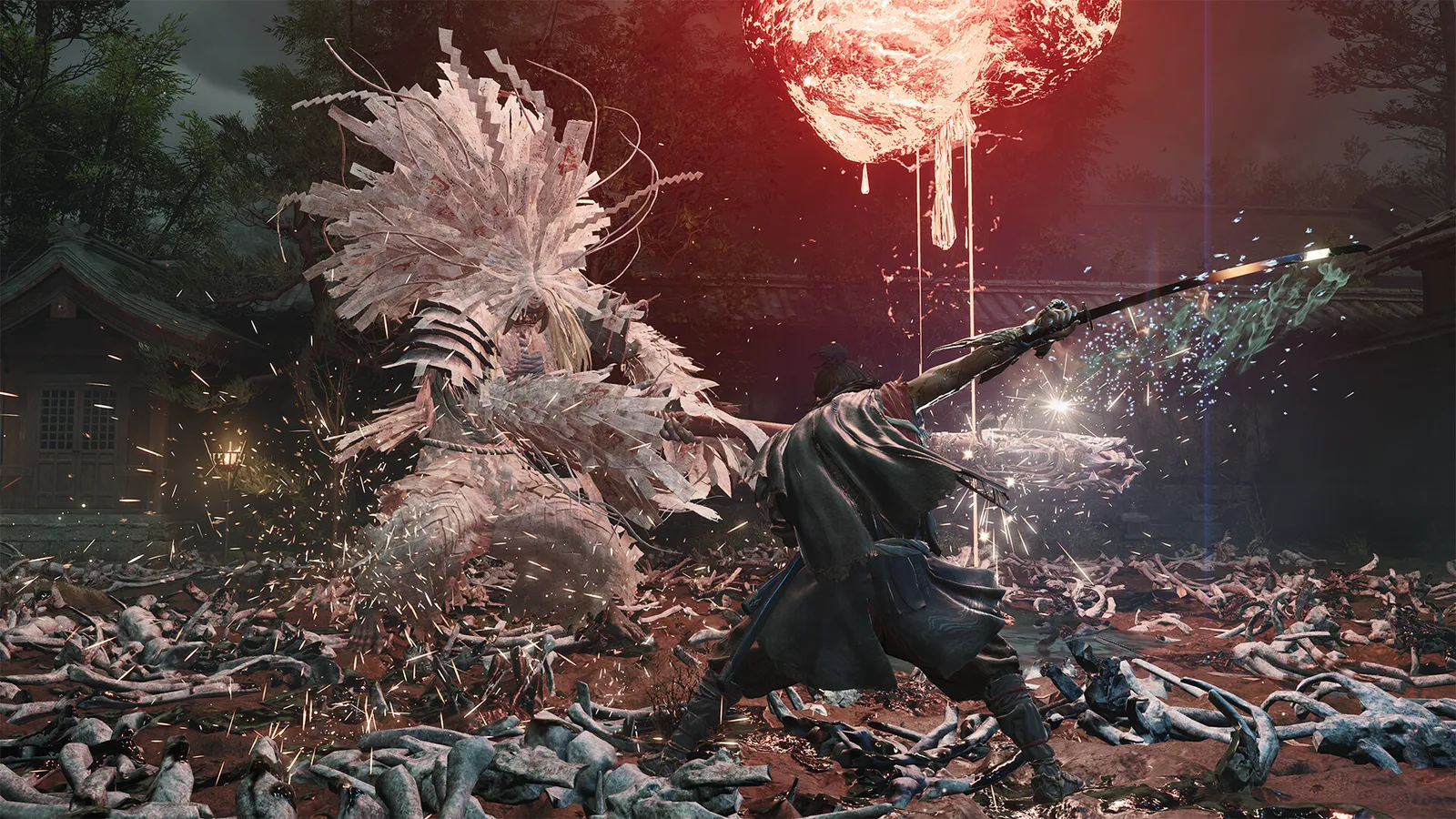 Onimusha Way of the Sword combat screenshot of a samurai clashing blades with a giant genma foe in a burning village