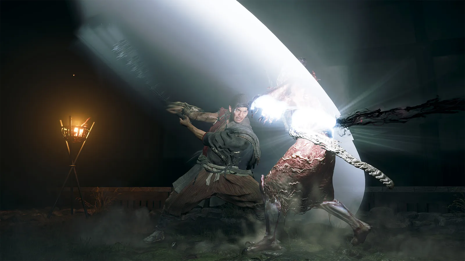 Onimusha Way of the Sword screenshot of a katana duel inside a torch-lit Edo-period Kyoto temple corridor