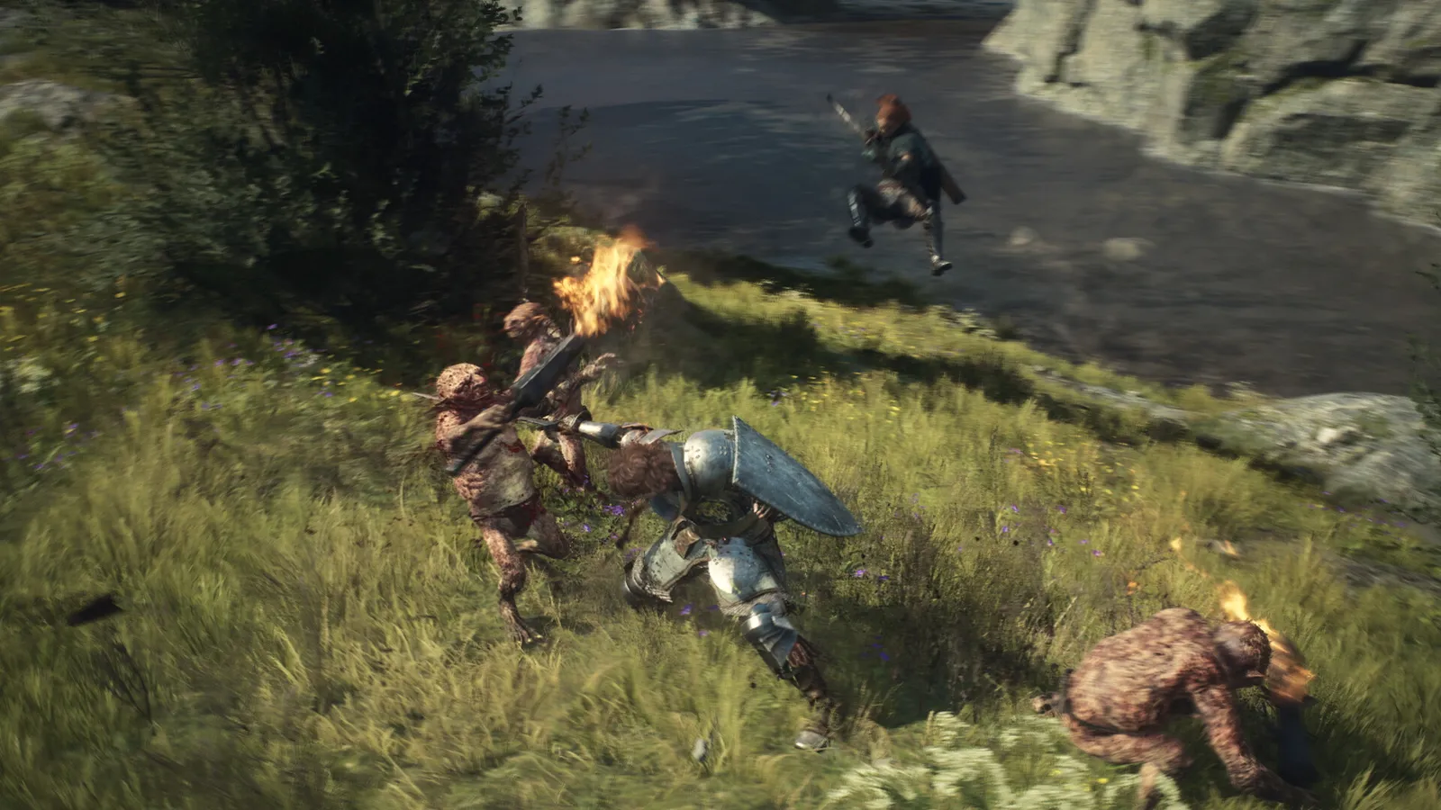 Dragon's Dogma 2 screenshot showing characters in a scenic forested environment at dusk