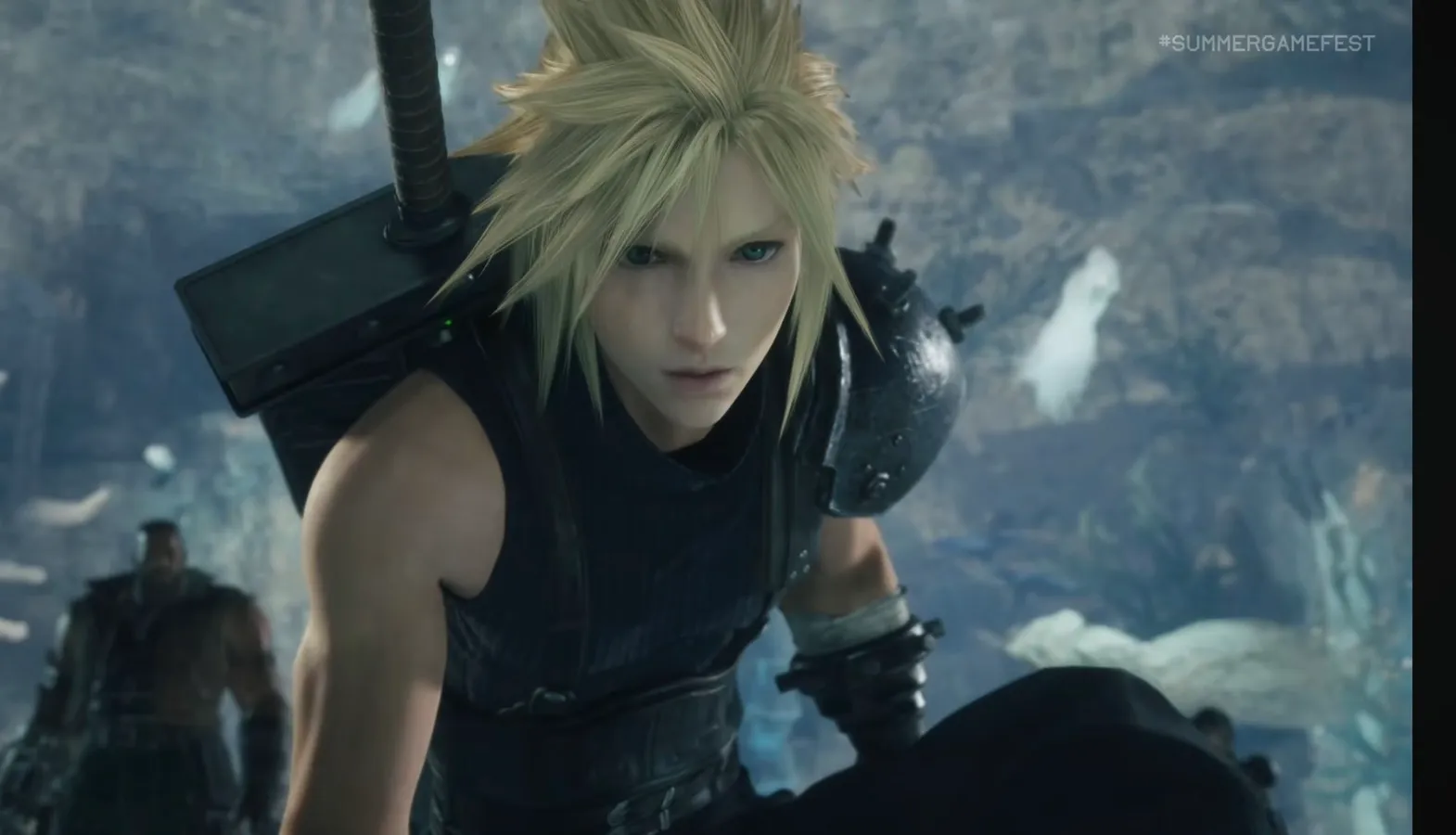 Final Fantasy VII Revelation trailer screenshot showing Cloud and the party facing a massive enemy