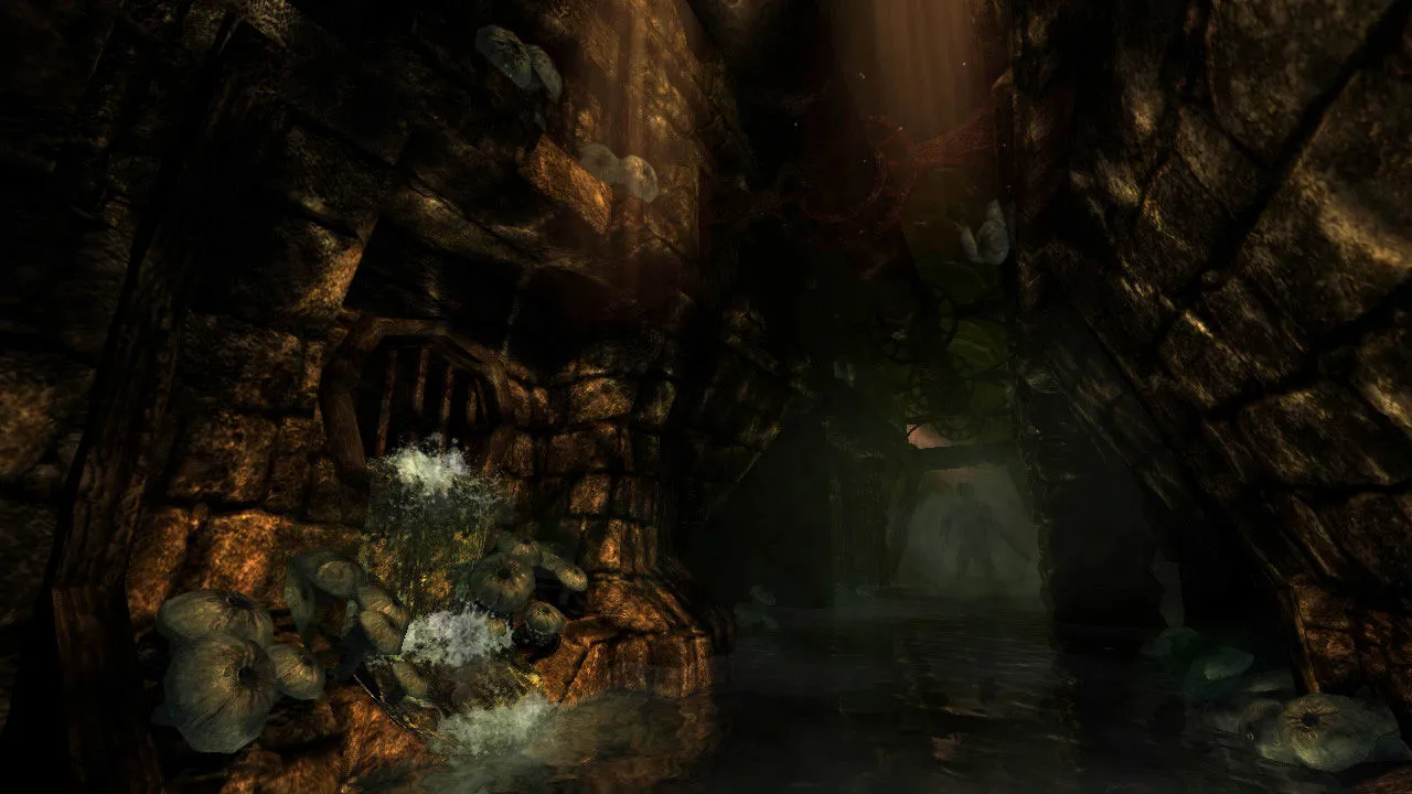 Dark stone corridor in Amnesia: The Dark Descent with a faint candle flame lighting the way