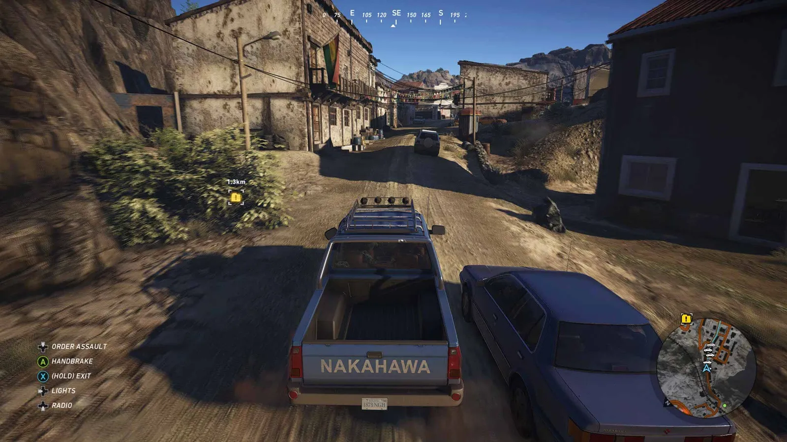 Ghost Recon Wildlands open world view of a village in the Itacua region with missions in the journal