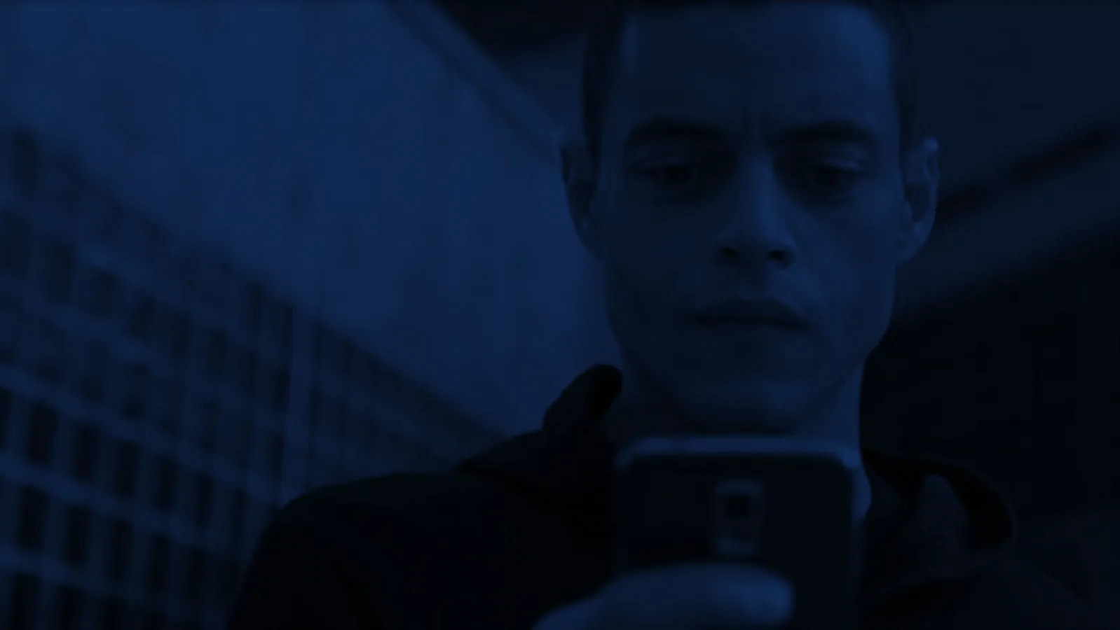 Mr Robot mobile game cinematic still from Night School Studio showing a dark, surveillance themed interface