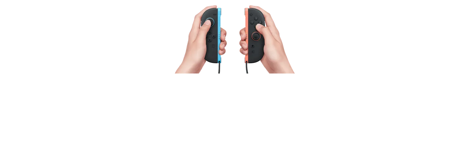 Hands holding a pair of detached Nintendo Switch 2 Joy-Con controllers