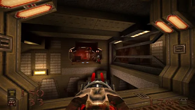 The player aims the new Laser Cannon down a dark futuristic corridor in Quake Dawn of the Machine, ricocheting projectiles lighting up the walls.