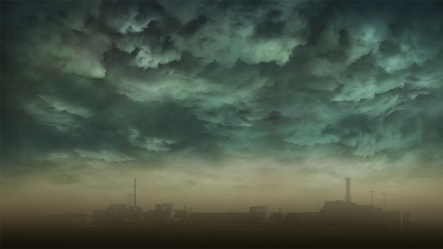 Wide shot of the Zone at dusk with anomalies glowing over the rooftops in Stalker 2 Heart of Chornobyl