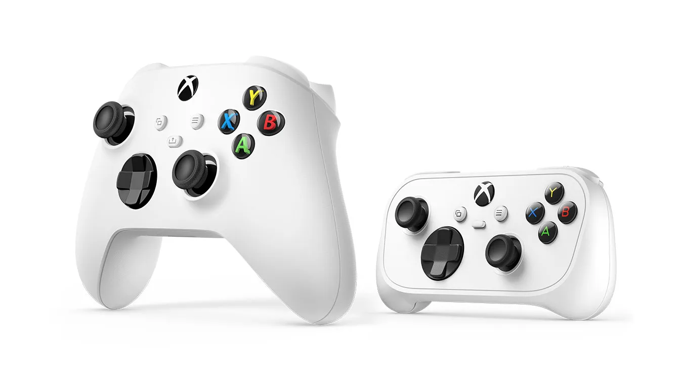 The Xbox Wireless Controller sitting behind the much smaller Xbox Nano Controller