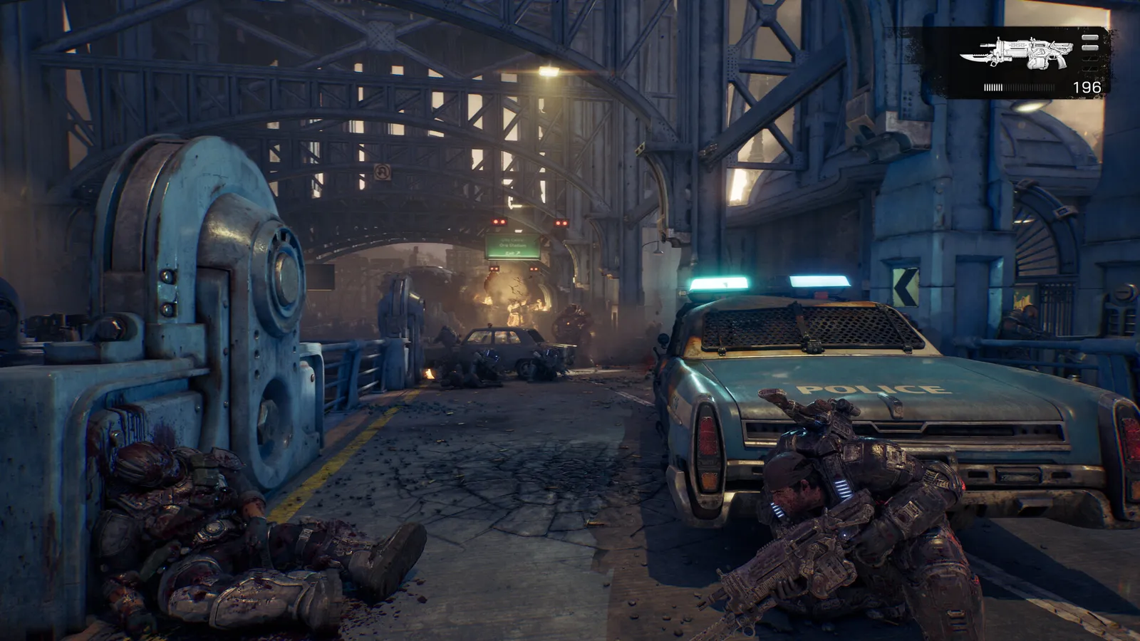 Official Gears of War E-Day screenshot of a firefight in a damaged street