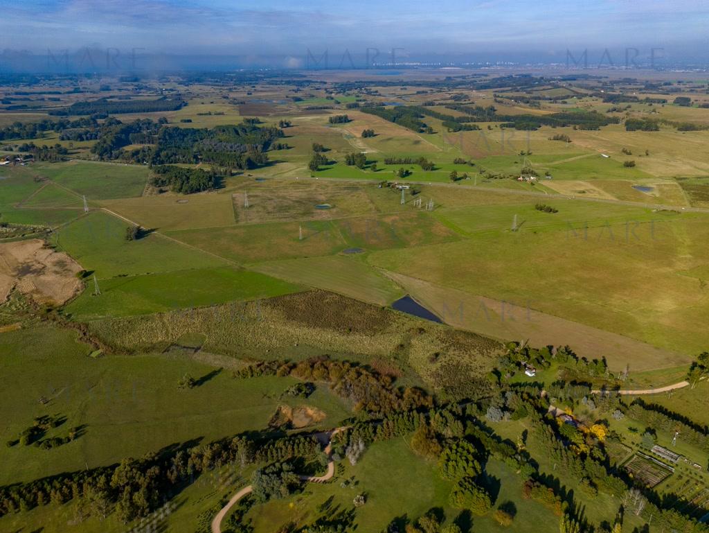 11-hectare plot of land on Route 104. - Photo 6