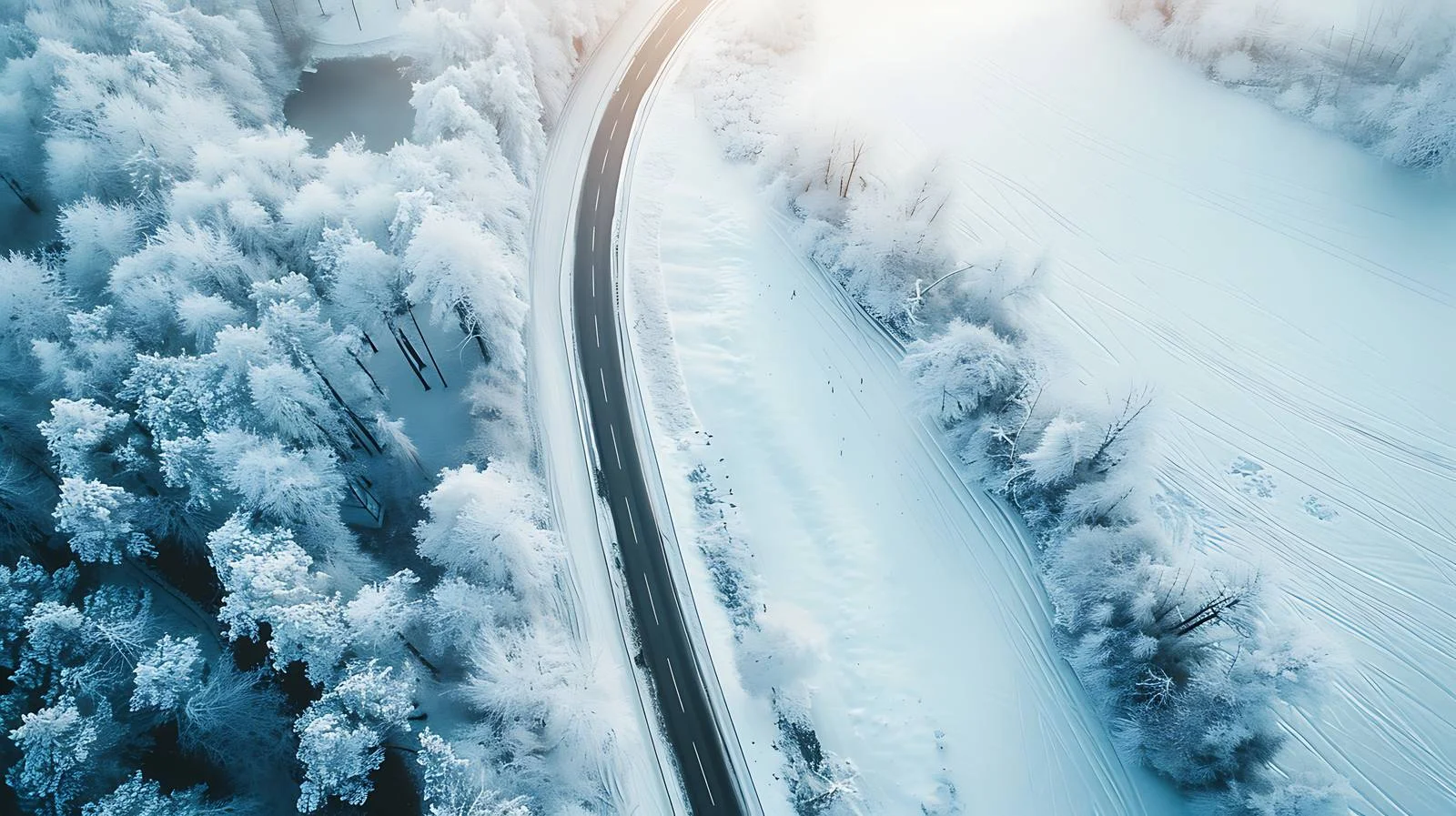 Winter Aerial View of Curving Road — free download from Dotvec