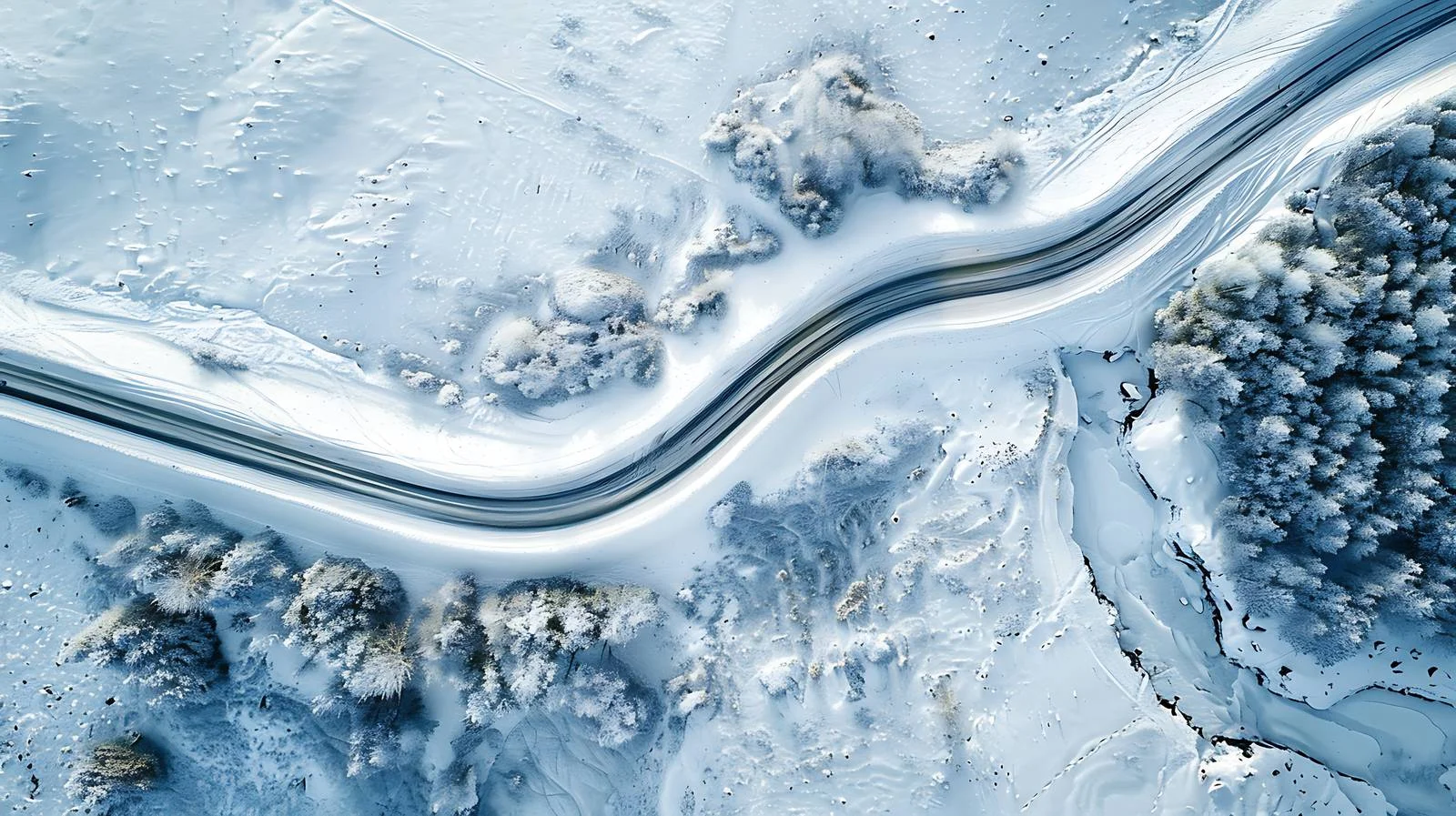 Winter Aerial View of Serpentine Road — free download from Dotvec