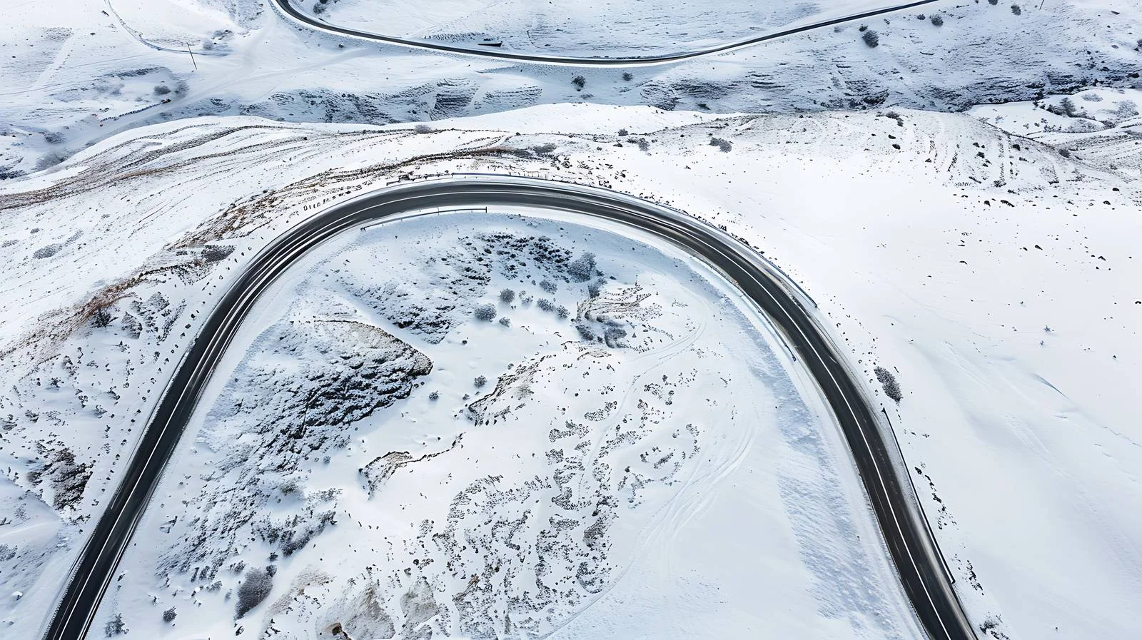 Winter Scenic Aerial View of Curvy Road — free download from Dotvec