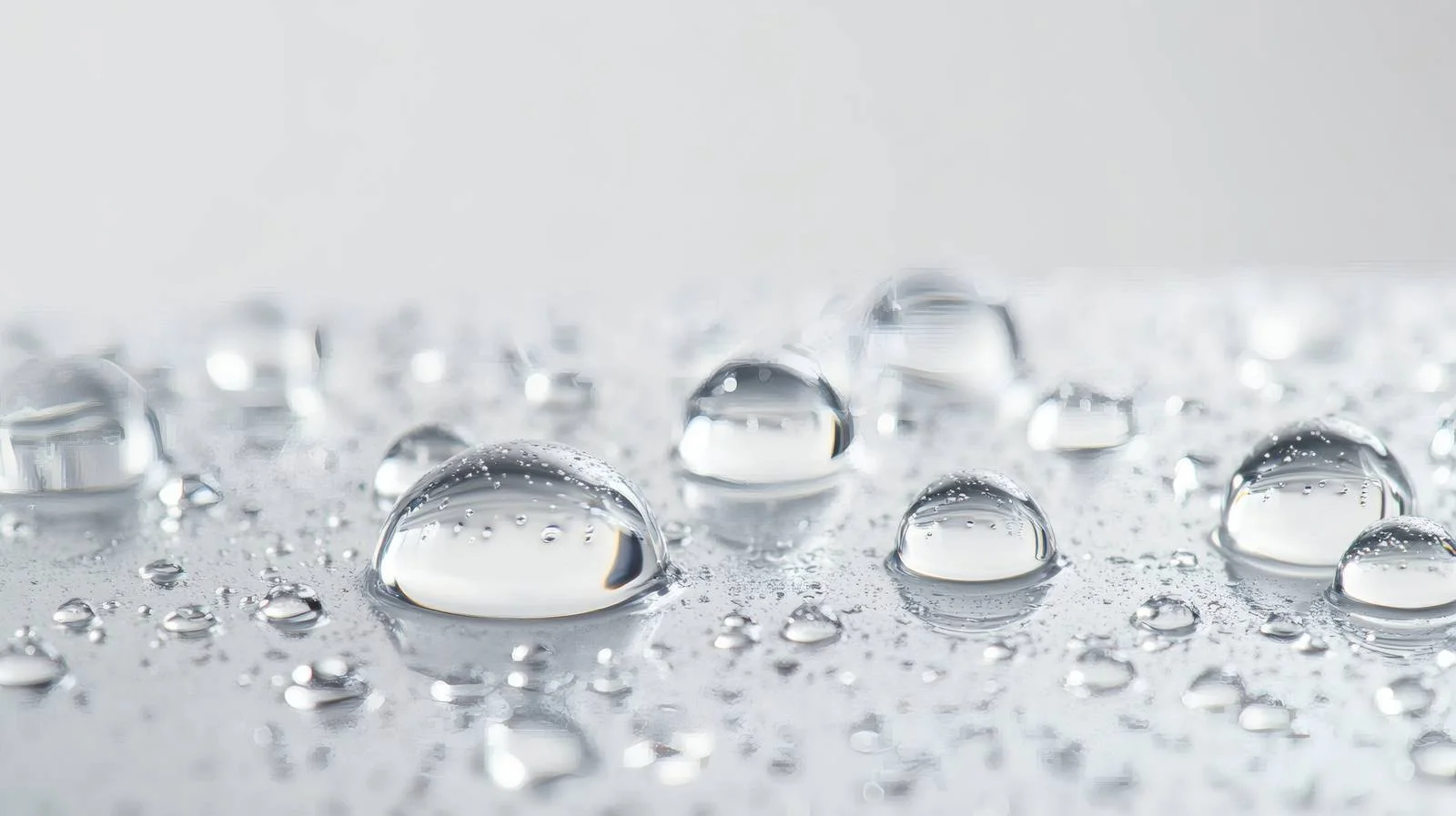 Transparent gel droplets on white backdrop — free download from Dotvec