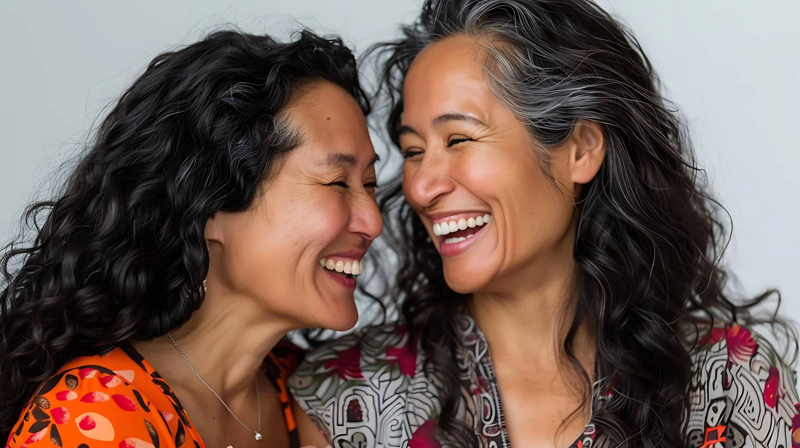 Joyful Mother and Daughter Laughing Together — free download from Dotvec