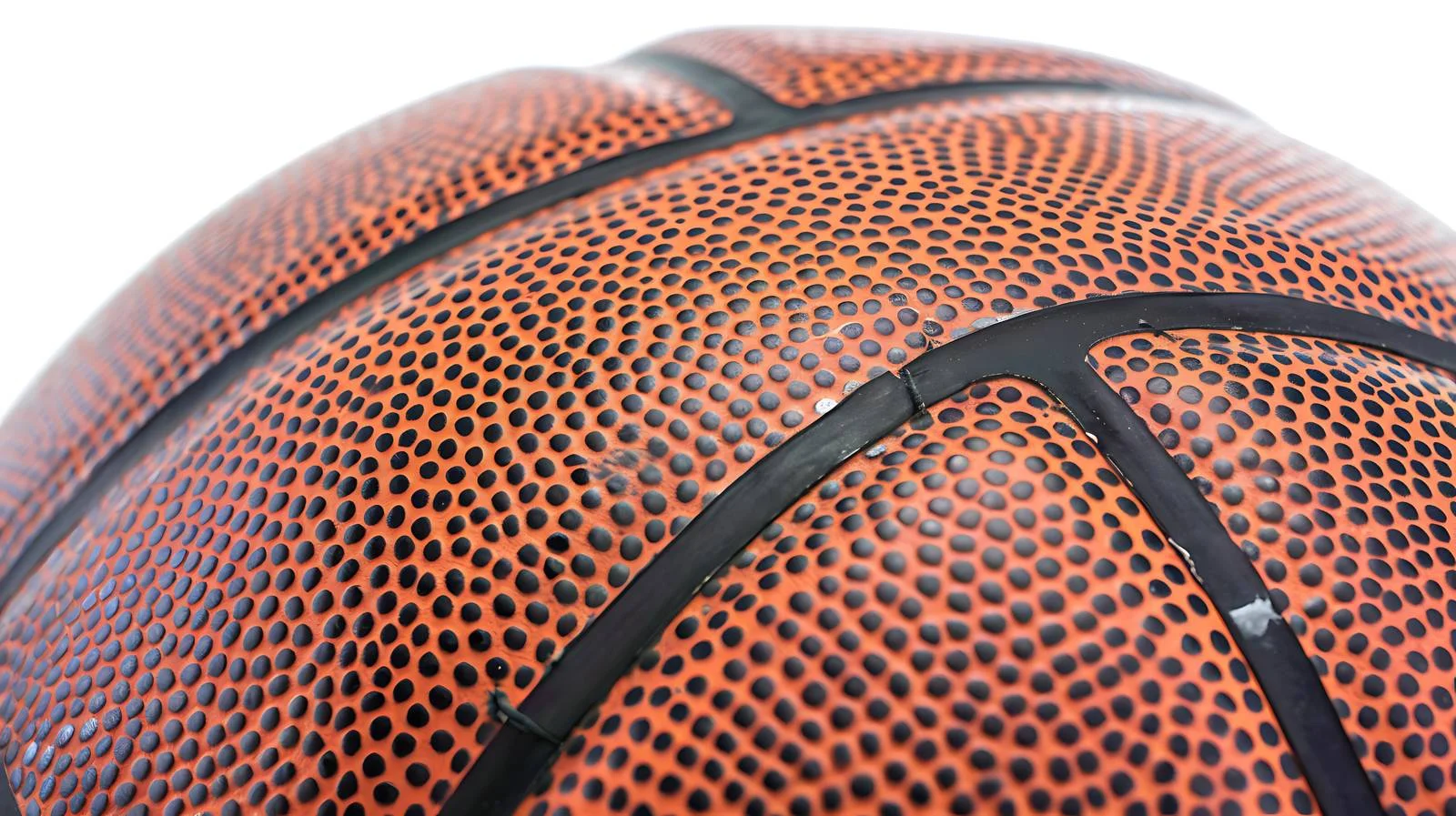 Detailed view of basketball ball seams — free download from Dotvec