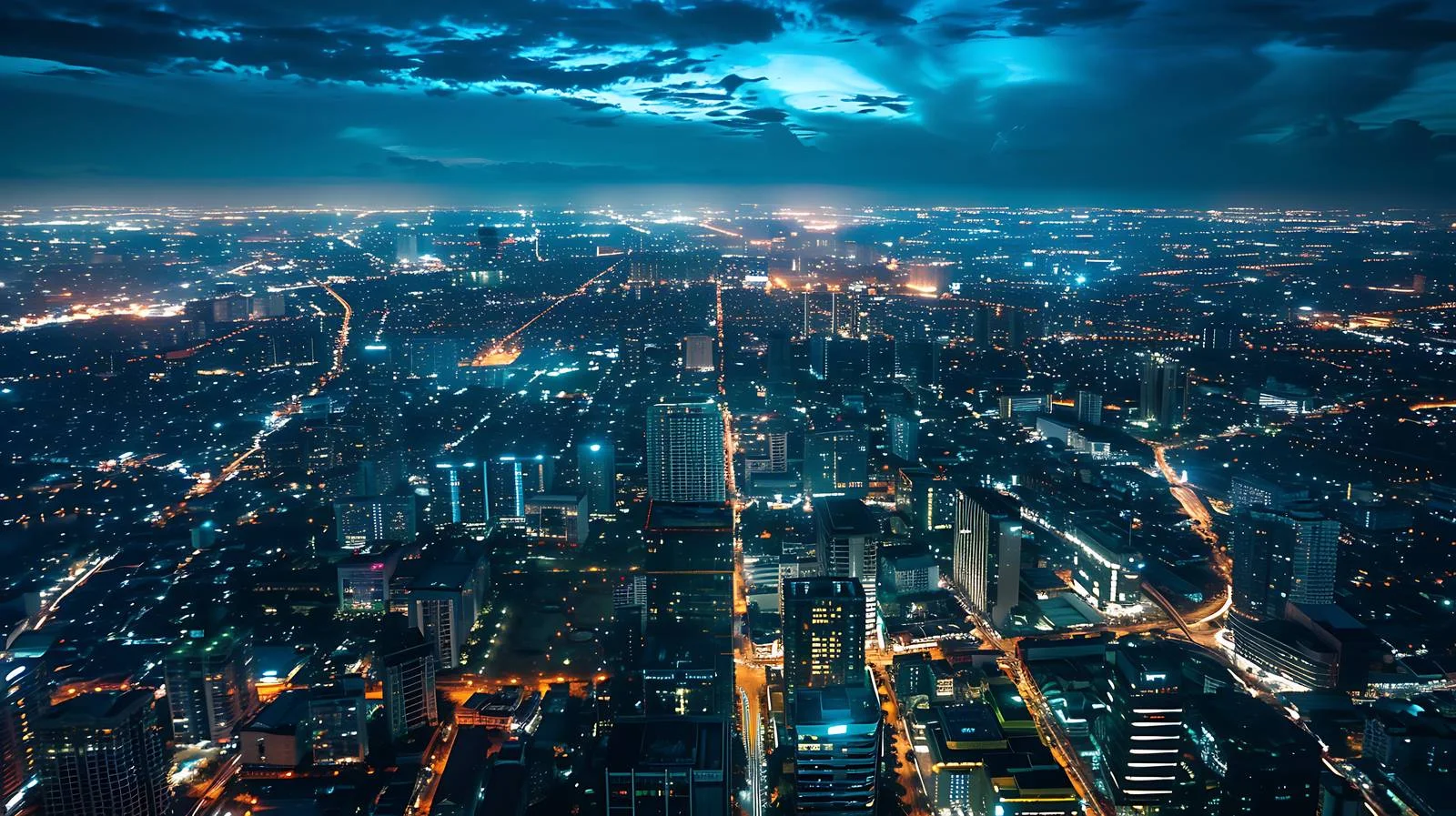 Nighttime Cityscape Aerial View with Lights — free download from Dotvec