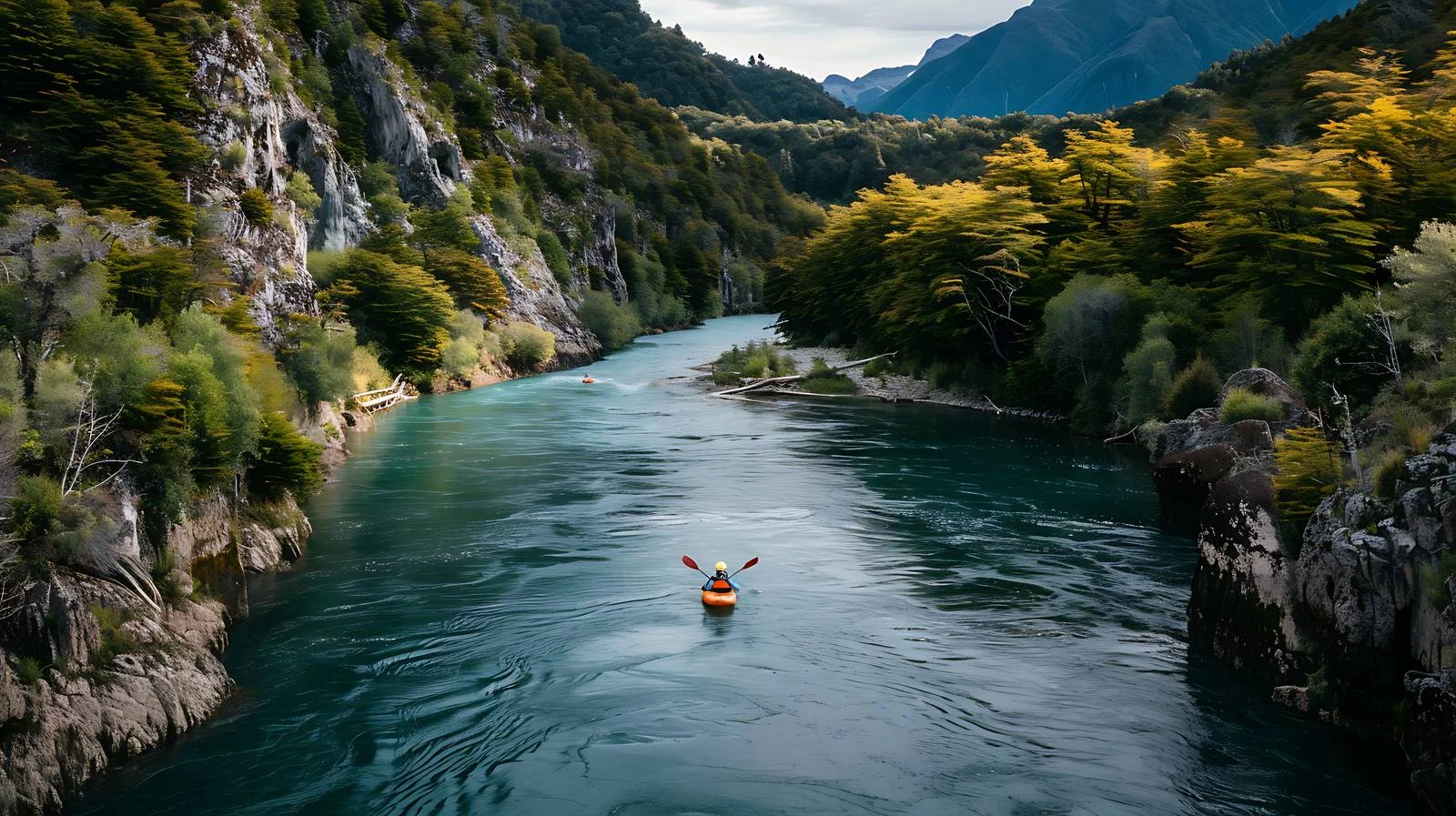 Thrilling Kayaker on Class 5 River – free descending image from Dotvec