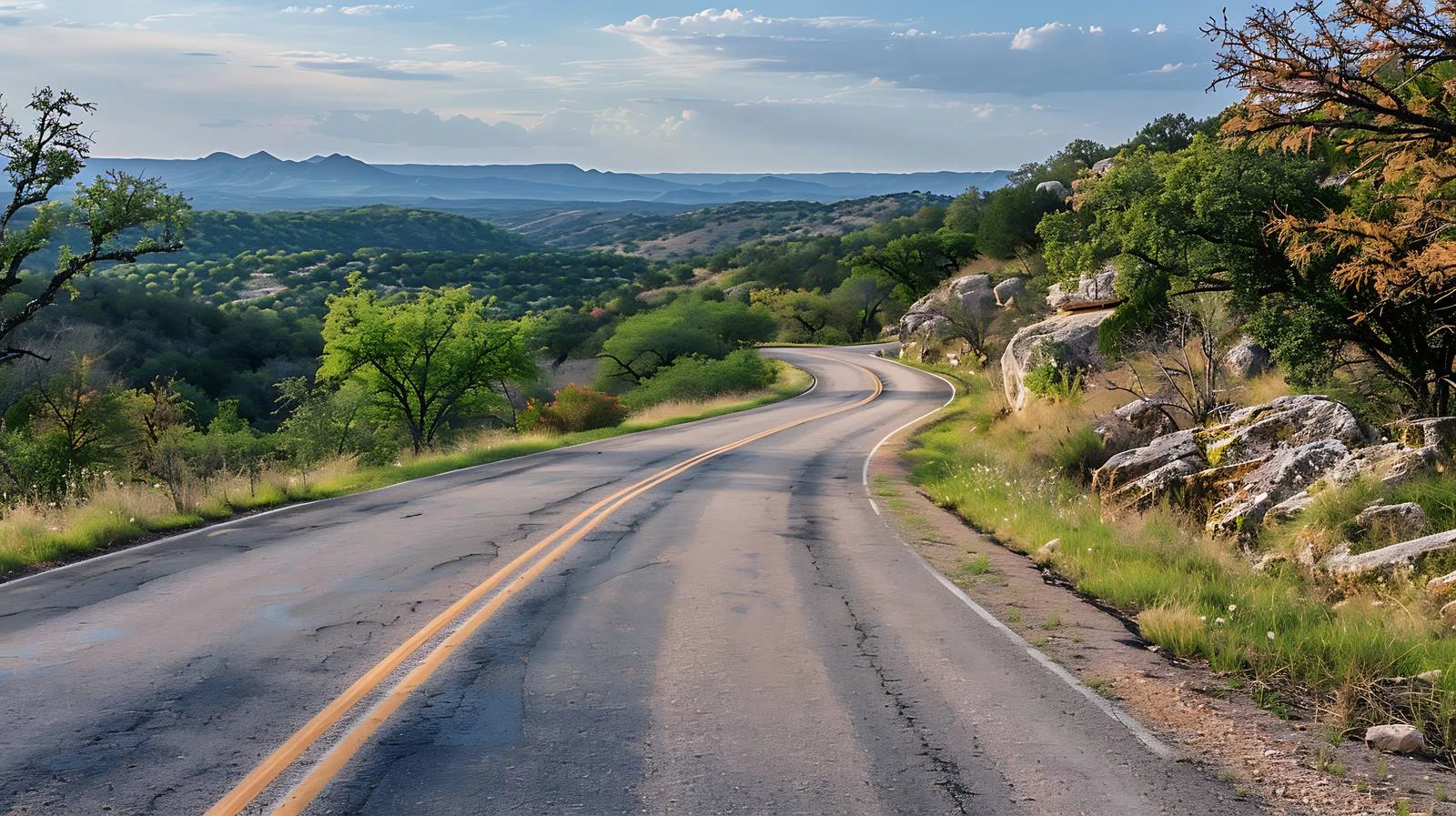 Scenic Winding Road in Texas Hills — free download from Dotvec