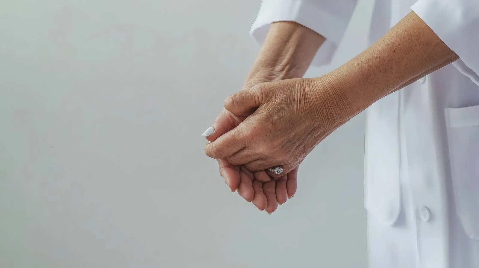 Compassionate Nurse Comforting Elderly Woman — free download from Dotvec