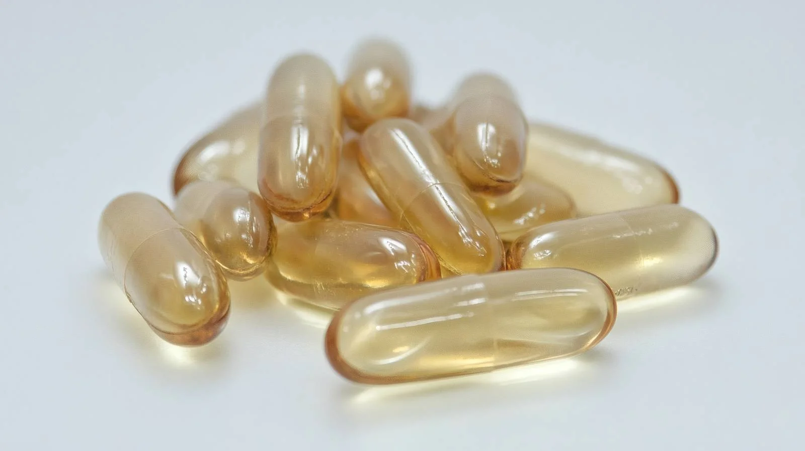 Isolated Omega-3 Softgel Capsules on White — free download from Dotvec