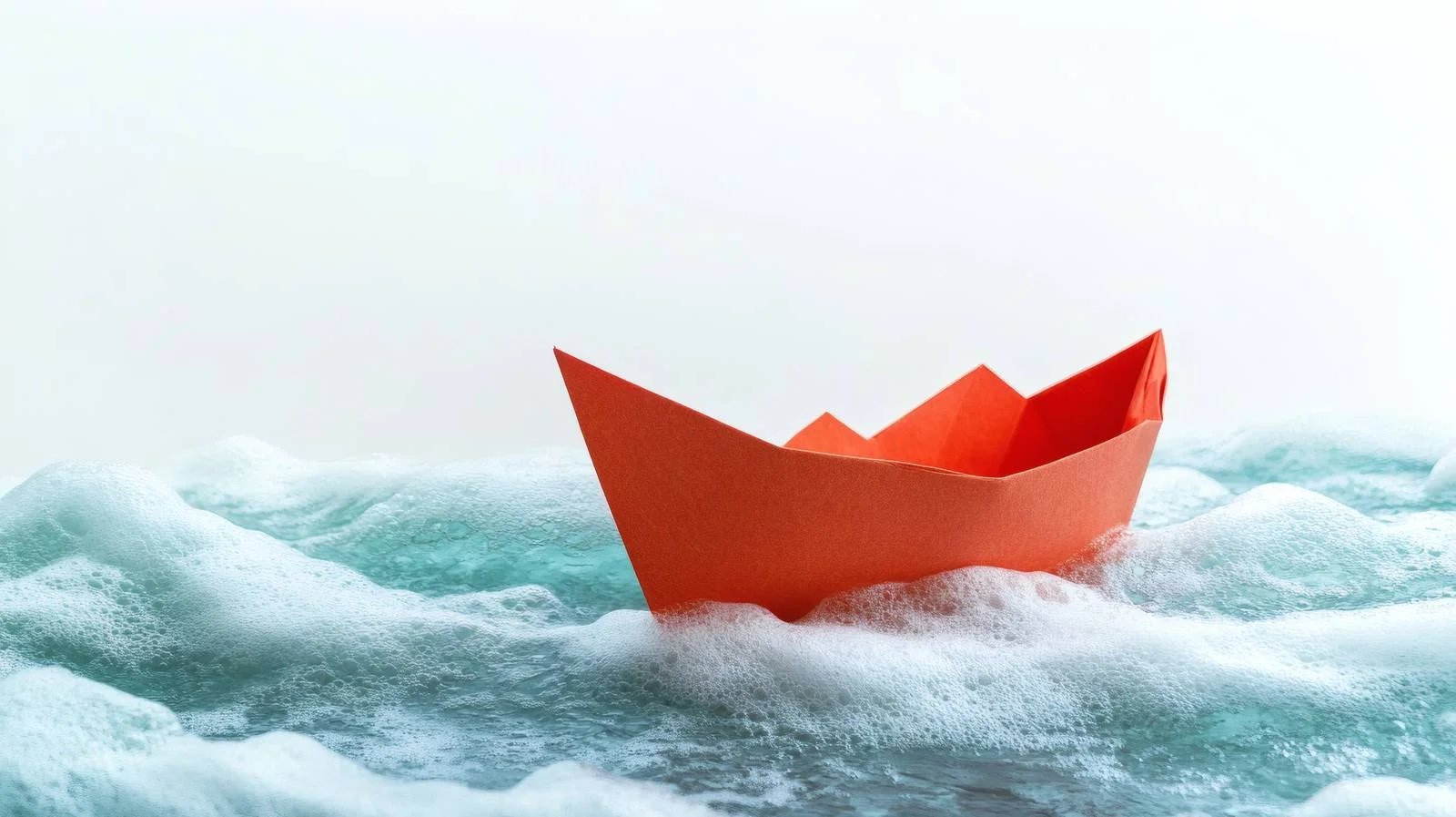 Paper Boat Amid Turbulent Sea Waves — free download from Dotvec