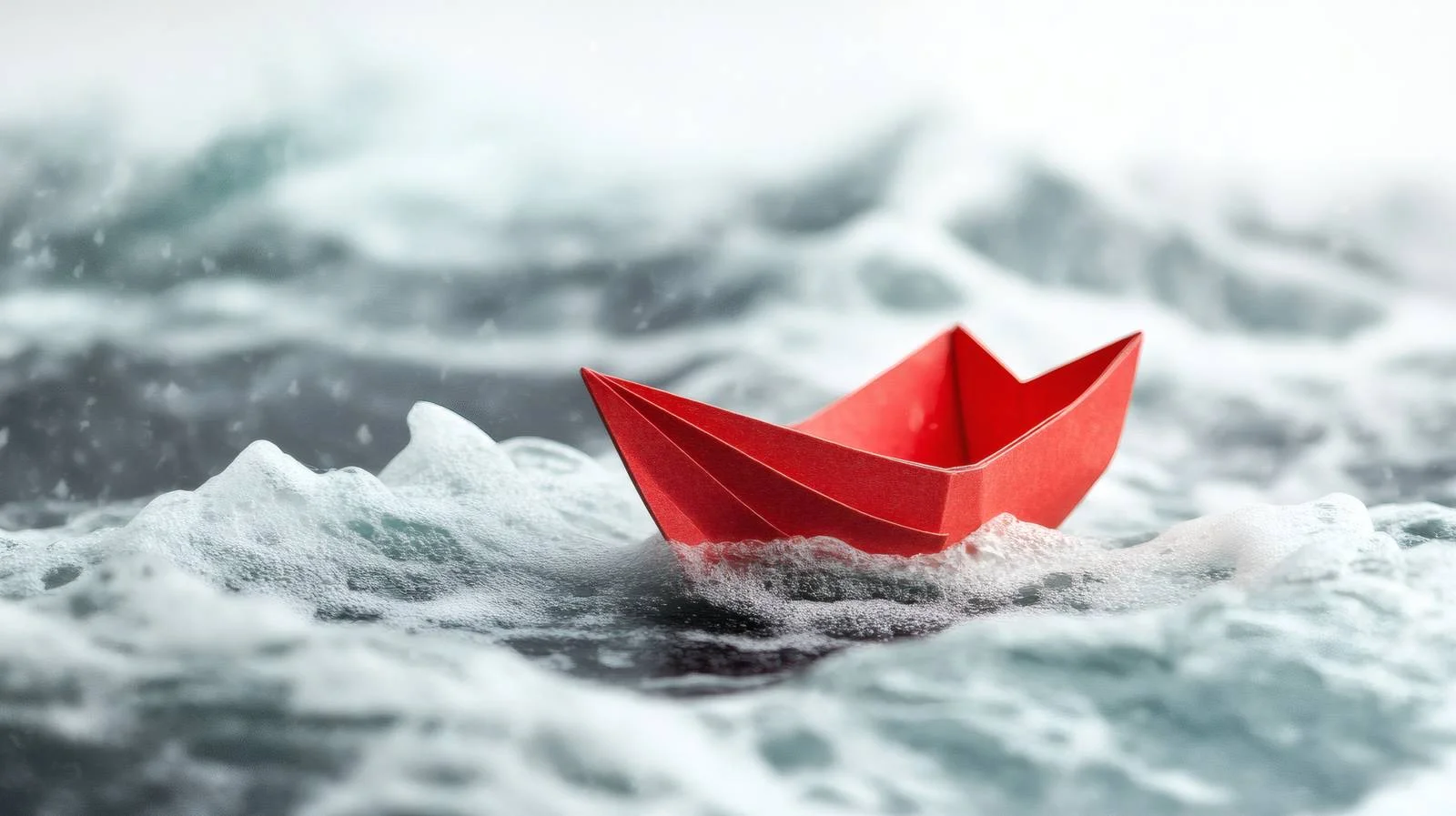 Paper Boat Struggling in Stormy Waves — free download from Dotvec